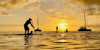Where can you try out standup paddleboarding during your stay in Nice?
